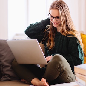 Woman studying on laptop